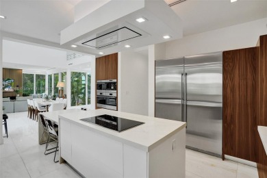 Luxurious coastal living in the exclusive island community of on Crandon Golf At Key Biscayne in Florida - for sale on GolfHomes.com, golf home, golf lot