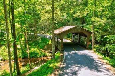 Discover this beautiful lot on .82 acres in the highly on Big Canoe Golf Club - Cherokee in Georgia - for sale on GolfHomes.com, golf home, golf lot