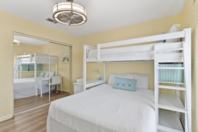 This beautifully updated freestanding three-bedroom beach villa on Sandpiper Cove Golf Course in Florida - for sale on GolfHomes.com, golf home, golf lot