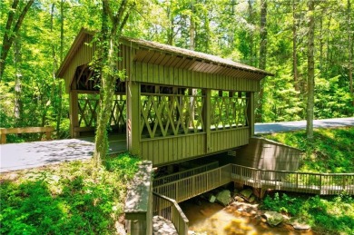 Discover this beautiful lot on .82 acres in the highly on Big Canoe Golf Club - Cherokee in Georgia - for sale on GolfHomes.com, golf home, golf lot