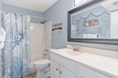 This beautifully updated freestanding three-bedroom beach villa on Sandpiper Cove Golf Course in Florida - for sale on GolfHomes.com, golf home, golf lot