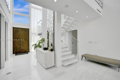 Luxurious coastal living in the exclusive island community of on Crandon Golf At Key Biscayne in Florida - for sale on GolfHomes.com, golf home, golf lot