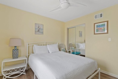 This beautifully updated freestanding three-bedroom beach villa on Sandpiper Cove Golf Course in Florida - for sale on GolfHomes.com, golf home, golf lot