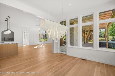 Discover a newly built hidden gem nestled on a quiet street on River Valley Ranch Golf Club in Colorado - for sale on GolfHomes.com, golf home, golf lot