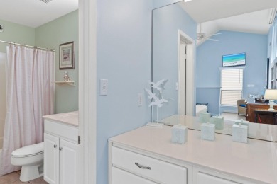 This beautifully updated freestanding three-bedroom beach villa on Sandpiper Cove Golf Course in Florida - for sale on GolfHomes.com, golf home, golf lot