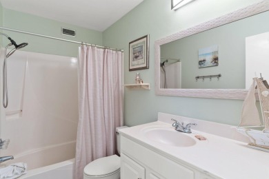 This beautifully updated freestanding three-bedroom beach villa on Sandpiper Cove Golf Course in Florida - for sale on GolfHomes.com, golf home, golf lot