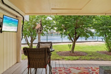 This beautifully updated freestanding three-bedroom beach villa on Sandpiper Cove Golf Course in Florida - for sale on GolfHomes.com, golf home, golf lot