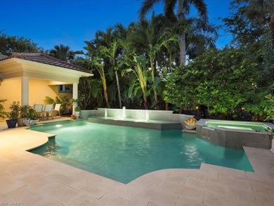 A refined sense of privacy and coastal elegance defines this on Pelican Marsh Golf Club in Florida - for sale on GolfHomes.com, golf home, golf lot