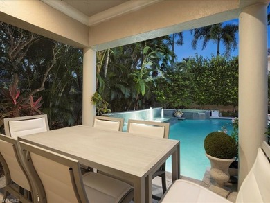 A refined sense of privacy and coastal elegance defines this on Pelican Marsh Golf Club in Florida - for sale on GolfHomes.com, golf home, golf lot