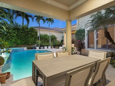 A refined sense of privacy and coastal elegance defines this on Pelican Marsh Golf Club in Florida - for sale on GolfHomes.com, golf home, golf lot