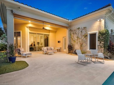 A refined sense of privacy and coastal elegance defines this on Pelican Marsh Golf Club in Florida - for sale on GolfHomes.com, golf home, golf lot