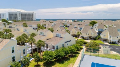 This beautifully updated freestanding three-bedroom beach villa on Sandpiper Cove Golf Course in Florida - for sale on GolfHomes.com, golf home, golf lot