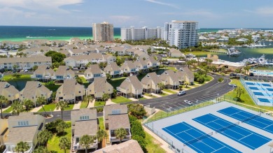 This beautifully updated freestanding three-bedroom beach villa on Sandpiper Cove Golf Course in Florida - for sale on GolfHomes.com, golf home, golf lot