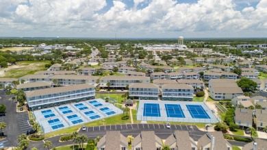 This beautifully updated freestanding three-bedroom beach villa on Sandpiper Cove Golf Course in Florida - for sale on GolfHomes.com, golf home, golf lot