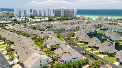 This beautifully updated freestanding three-bedroom beach villa on Sandpiper Cove Golf Course in Florida - for sale on GolfHomes.com, golf home, golf lot