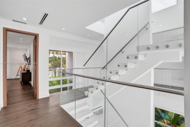 Luxurious coastal living in the exclusive island community of on Crandon Golf At Key Biscayne in Florida - for sale on GolfHomes.com, golf home, golf lot