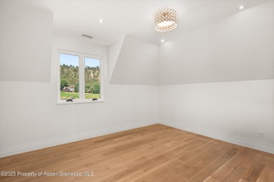 Discover a newly built hidden gem nestled on a quiet street on River Valley Ranch Golf Club in Colorado - for sale on GolfHomes.com, golf home, golf lot