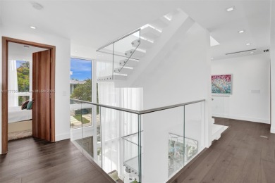 Luxurious coastal living in the exclusive island community of on Crandon Golf At Key Biscayne in Florida - for sale on GolfHomes.com, golf home, golf lot