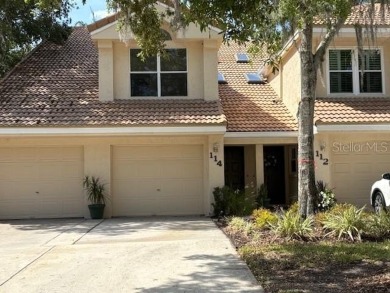 Light and bright 3BED/2BA Condominium with attached garage on East Lake Woodlands Country Club in Florida - for sale on GolfHomes.com, golf home, golf lot