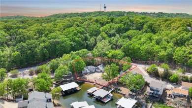 Discover this waterfront retreat with easy walkout to shoreline on Seasons Ridge At Four Seasons in Missouri - for sale on GolfHomes.com, golf home, golf lot