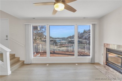 Discover this waterfront retreat with easy walkout to shoreline on Seasons Ridge At Four Seasons in Missouri - for sale on GolfHomes.com, golf home, golf lot