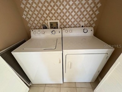 Light and bright 3BED/2BA Condominium with attached garage on East Lake Woodlands Country Club in Florida - for sale on GolfHomes.com, golf home, golf lot