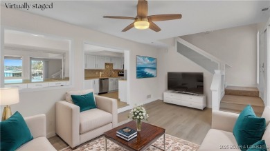 Discover this waterfront retreat with easy walkout to shoreline on Seasons Ridge At Four Seasons in Missouri - for sale on GolfHomes.com, golf home, golf lot