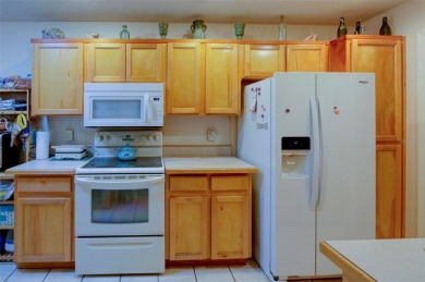 Welcome home to maintenance free living at this outstanding and on Heather Golf and Country Club in Florida - for sale on GolfHomes.com, golf home, golf lot