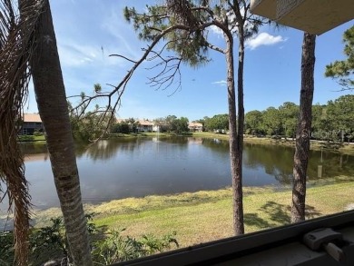 Light and bright 3BED/2BA Condominium with attached garage on East Lake Woodlands Country Club in Florida - for sale on GolfHomes.com, golf home, golf lot