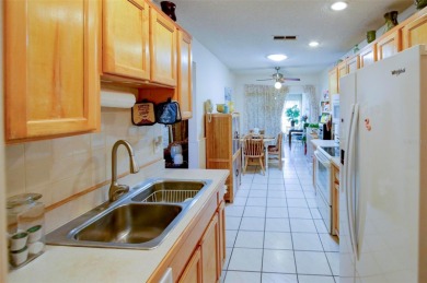 Welcome home to maintenance free living at this outstanding and on Heather Golf and Country Club in Florida - for sale on GolfHomes.com, golf home, golf lot
