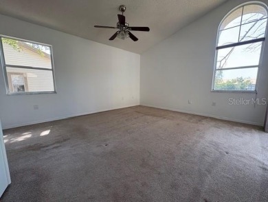 Light and bright 3BED/2BA Condominium with attached garage on East Lake Woodlands Country Club in Florida - for sale on GolfHomes.com, golf home, golf lot