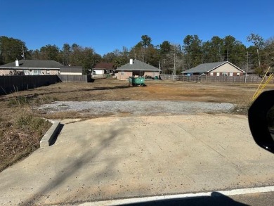 Come check out this cleared lot with culvert and concrete on Diamondhead Country Club in Mississippi - for sale on GolfHomes.com, golf home, golf lot