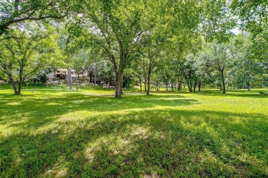 ENCHANTING 3-3-2 home nestled on a beautiful 1+ acre riverfront on Pecan Plantation Country Club in Texas - for sale on GolfHomes.com, golf home, golf lot