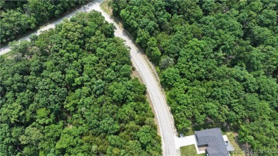 Don't miss this opportunity to create your custom lake lifestyle on The Club At Porto Cima in Missouri - for sale on GolfHomes.com, golf home, golf lot