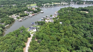 Don't miss this opportunity to create your custom lake lifestyle on The Club At Porto Cima in Missouri - for sale on GolfHomes.com, golf home, golf lot