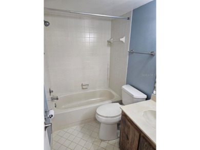 ** REDUCED PRICE ** Great water view from this 2nd floor villa on Isla Del Sol Yacht and Country Club in Florida - for sale on GolfHomes.com, golf home, golf lot
