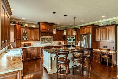Welcome to your dream home located on the 16th hole of Coyote on Coyote Crossing Golf Course in Indiana - for sale on GolfHomes.com, golf home, golf lot