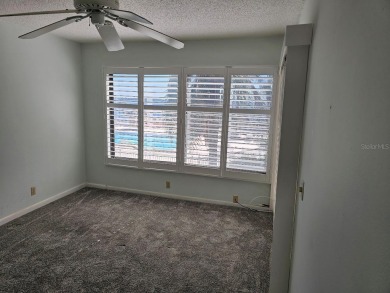 ** REDUCED PRICE ** Great water view from this 2nd floor villa on Isla Del Sol Yacht and Country Club in Florida - for sale on GolfHomes.com, golf home, golf lot