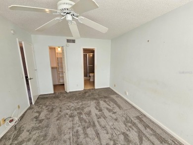 ** REDUCED PRICE ** Great water view from this 2nd floor villa on Isla Del Sol Yacht and Country Club in Florida - for sale on GolfHomes.com, golf home, golf lot