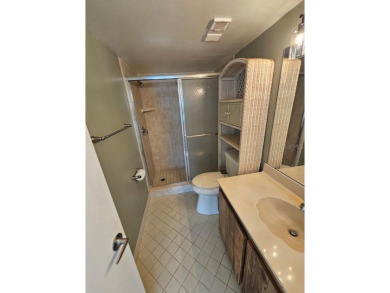 ** REDUCED PRICE ** Great water view from this 2nd floor villa on Isla Del Sol Yacht and Country Club in Florida - for sale on GolfHomes.com, golf home, golf lot