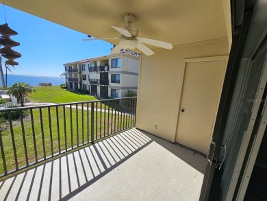 ** REDUCED PRICE ** Great water view from this 2nd floor villa on Isla Del Sol Yacht and Country Club in Florida - for sale on GolfHomes.com, golf home, golf lot