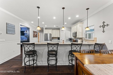 Custom-built Executive Home with gorgeous inground Saltwater on Magnolia Point Golf and Country Club in Florida - for sale on GolfHomes.com, golf home, golf lot