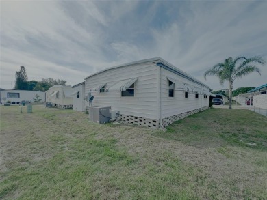 Spacious Home with some Updates - Priced to Sell! This large on Fairway Village Golf Course in Florida - for sale on GolfHomes.com, golf home, golf lot