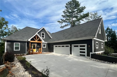 Welcome to this lakefront, newly-built custom home in the lovely on Keowee Key Golf and Country Club in South Carolina - for sale on GolfHomes.com, golf home, golf lot