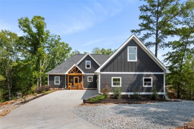 Welcome to this lakefront, newly-built custom home in the lovely on Keowee Key Golf and Country Club in South Carolina - for sale on GolfHomes.com, golf home, golf lot