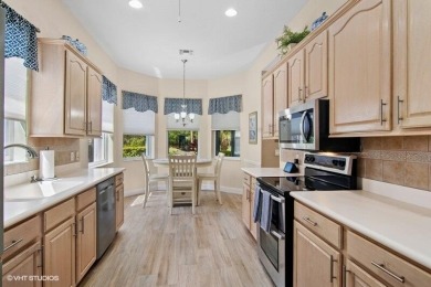 Welcome to this beautiful and spacious 2-bedroom, plus on PGA Golf Club in PGA Village in Florida - for sale on GolfHomes.com, golf home, golf lot