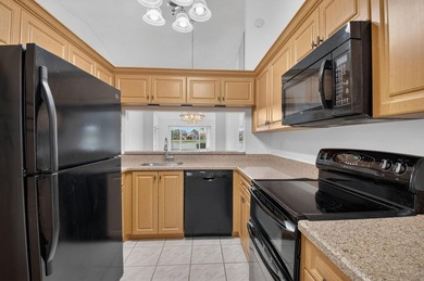 NICE VILLA OVER 1250 SF WITH A FABULOUS WATER VIEW. CATHEDRAL on Westchester Golf and Country Club in Florida - for sale on GolfHomes.com, golf home, golf lot