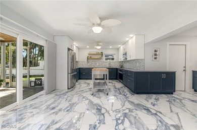 DISCOVER THE WATERFRONT LIFESTYLE YOU'VE BEEN DREAMING OF on El Rio Golf Course and Club in Florida - for sale on GolfHomes.com, golf home, golf lot