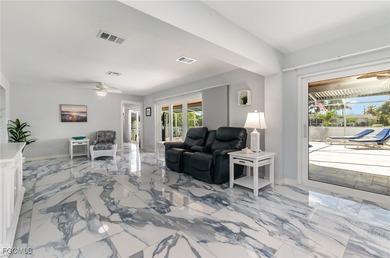 DISCOVER THE WATERFRONT LIFESTYLE YOU'VE BEEN DREAMING OF on El Rio Golf Course and Club in Florida - for sale on GolfHomes.com, golf home, golf lot