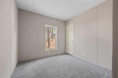 Less than one mile from the shores of Lake Sam Rayburn, this on Rayburn Country Club in Texas - for sale on GolfHomes.com, golf home, golf lot